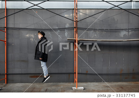 Young stylish redhead man in trendy outfit have 33137745