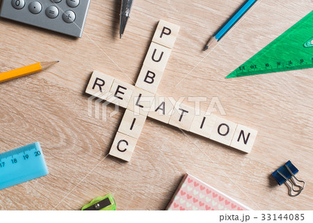 Conceptual business keywords on table with elements of game making crossword 33144085