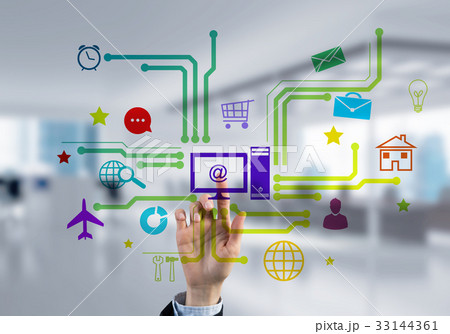 Modern office interior and close of businesswoman hand choosing icon on multimedia interface Modern office interior and close of businesswoman hand choosing icon on multimedia interface 33144361
