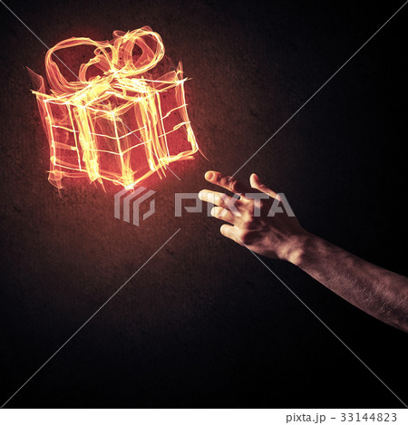 Concept of celebration with fire burning gift symbol and creatio Concept of celebration with fire burning gift symbol and creatio 33144823