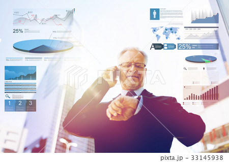 senior businessman calling on smartphone in city 33145938