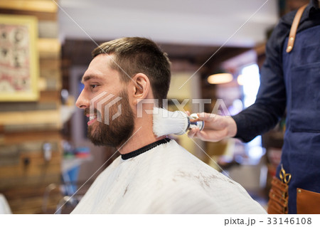 barber with brush cleaning male neck at barbershop barber with brush cleaning male neck at barbershop 33146108