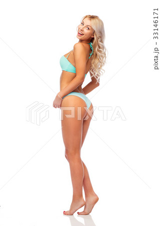 happy smiling young woman in bikini swimsuit 33146171