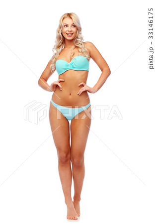 happy smiling young woman in bikini swimsuit 33146175
