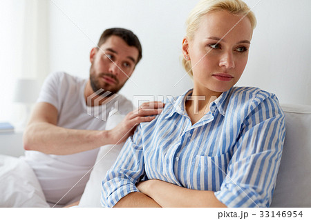 unhappy couple having conflict in bed at home 33146954