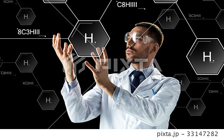 scientist in lab goggles chemical formula 33147282