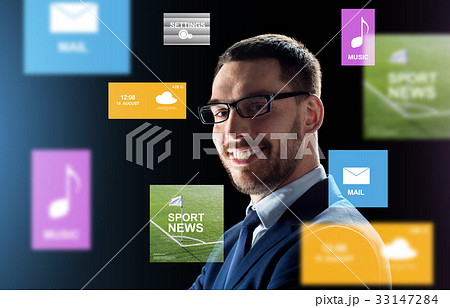 smiling businessman in glasses over black 33147284