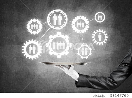 Waiter hand with white gloves holding silver plate full of social media communication icons Waiter hand with white gloves holding silver plate full of social media communication icons 33147769