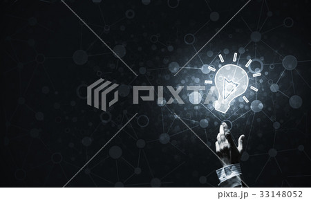 Technology idea concept with glowing bulb icon and touching it f 33148052