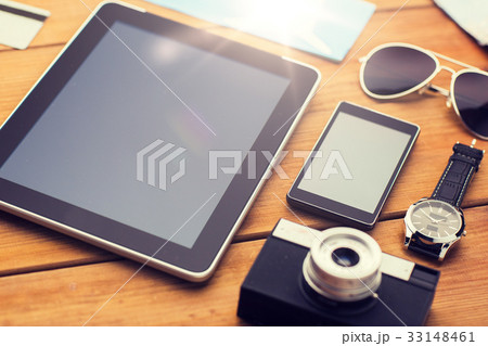 close up of smartphone and travel stuff 33148461