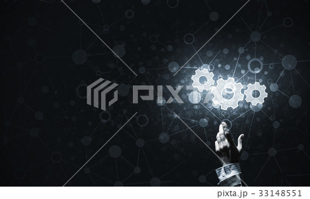 Technology conceptual image with gear digital symbol on dark bac Technology conceptual image with gear digital symbol on dark bac 33148551