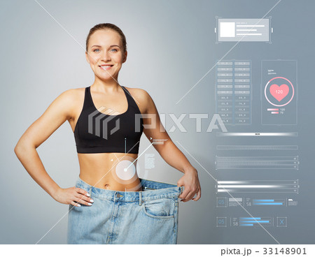 young slim sporty woman in large size pants 33148901