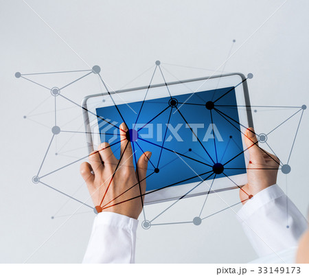 Close of female doctor hands working with tablet pc computer Close of female doctor hands working with tablet pc computer 33149173