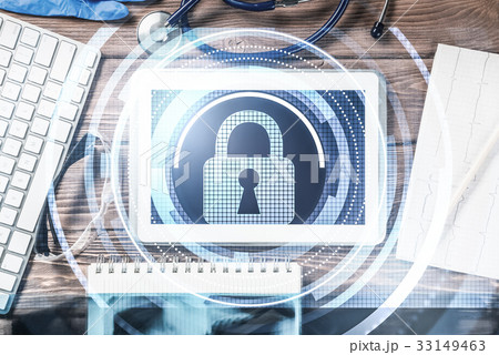 Top view of doctor workplace with tablet pc and medicine tools o Top view of doctor workplace with tablet pc and medicine tools o 33149463