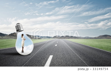Businesswoman inside light bulb 33149754