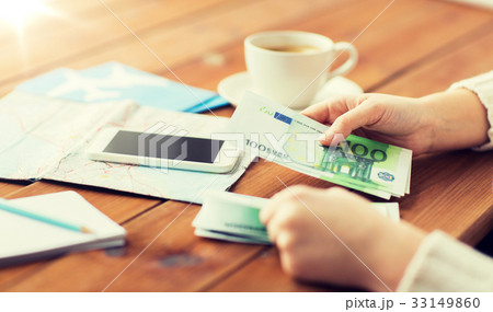 close up of traveler hands counting euro money 33149860