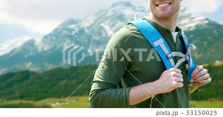 close up of happy man with backpack traveling close up of happy man with backpack traveling 33150025