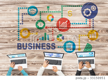 Top view of businesspeople sitting at table and using gadgets 33150951