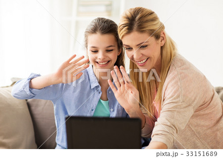 happy family with tablet pc at home 33151689