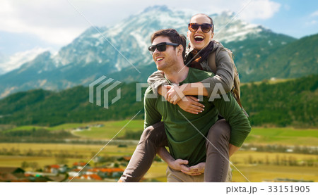 happy couple with backpacks traveling in highlands 33151905