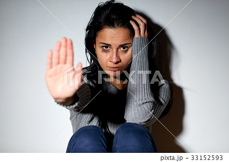 unhappy woman crying on floor at home unhappy woman crying on floor at home 33152593