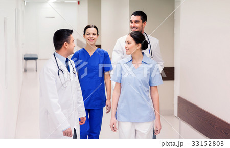 group of happy medics or doctors at hospital group of happy medics or doctors at hospital 33152803