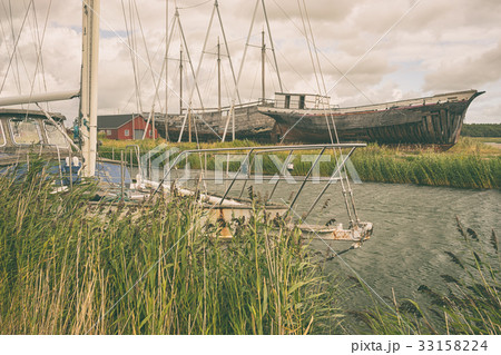 Old yacht and ships on the beach Old yacht and ships on the beach 33158224
