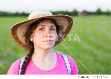Close up portrait woman with freckles in summer 33164700