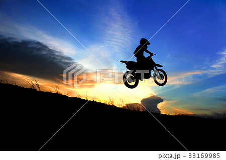 motorcycle silhouette are jumping 33169985