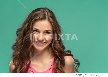 The young woman's portrait with happy emotions The young woman's portrait with happy emotions 33172969