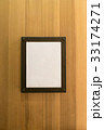 blank brown photo Frame wooden wall. Background  33174271