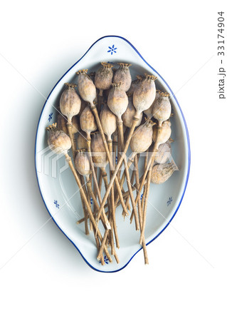 Dried poppy heads. 33174904