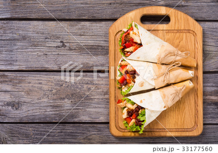 Mexican burrito with chicken 33177560