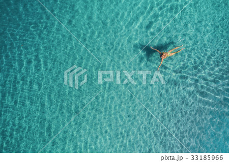 Aerial view of swimming woman in mediterranean sea 33185966