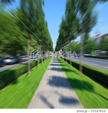 Bicycling by the empty alley Bicycling by the empty alley 33187618