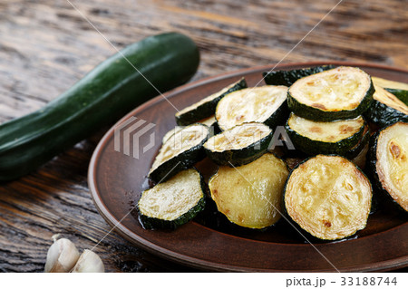 Fried and fresh zucchini Fried and fresh zucchini 33188744