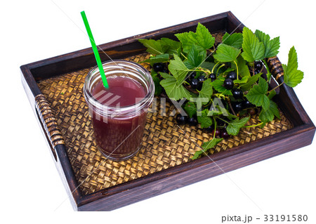 Wooden tray with juice and fresh berries of black Wooden tray with juice and fresh berries of black 33191580
