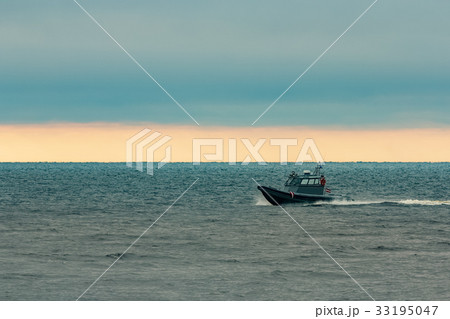 Small grey border guard boat Small grey border guard boat 33195047