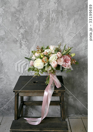 Spring bouquet of mixed flowers on vintage gray Spring bouquet of mixed flowers on vintage gray 33199689