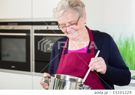 Grandma cooking comfort food  33201229