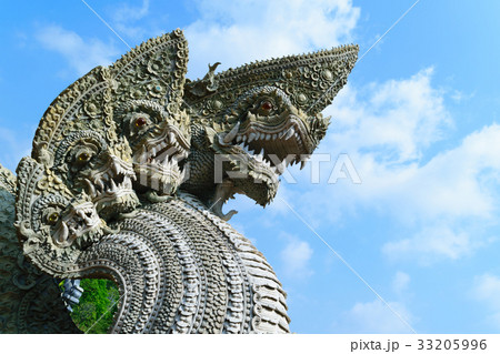 Serpent or naga statue head 33205996