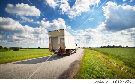 lorry moving on sunny evening 33207900