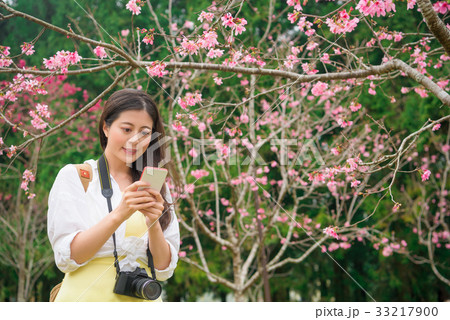 female travel woman carrying professional camera female travel woman carrying professional camera 33217900
