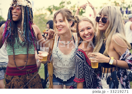 Group of Friends Drinking Beers Enjoying Music Festival Together Group of Friends Drinking Beers Enjoying Music Festival Together 33219271
