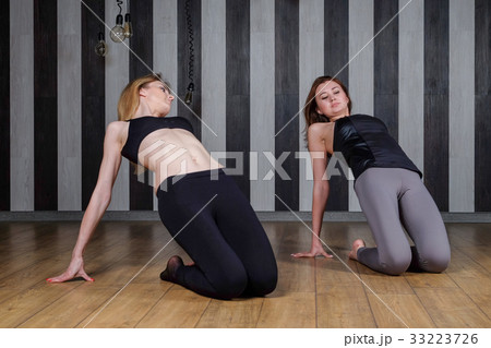 Two sports woman. Fitness instructor. Lesson with Two sports woman. Fitness instructor. Lesson with 33223726