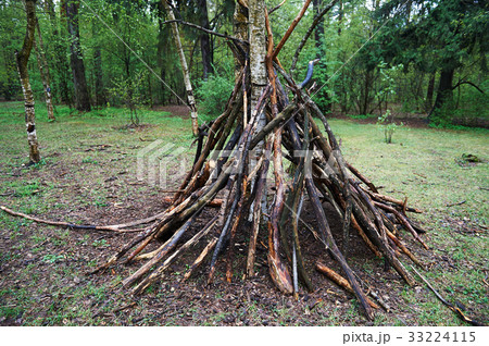 A hut of twigs in the forest. Nature, survival A hut of twigs in the forest. Nature, survival 33224115