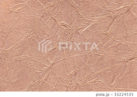 Light brown wavy background from textile material Light brown wavy background from textile material 33224535