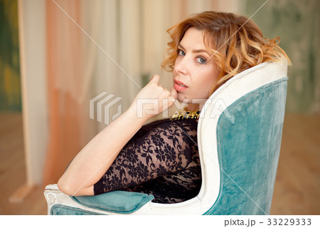 Image of elegant girl sitting in retro style 33229333