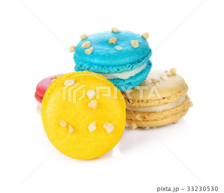 Tasty colorful macaroon on white background. Tasty colorful macaroon on white background. 33230530