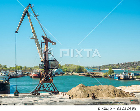 Landscape of tugboats and cranes in shipyard in Landscape of tugboats and cranes in shipyard in 33232498